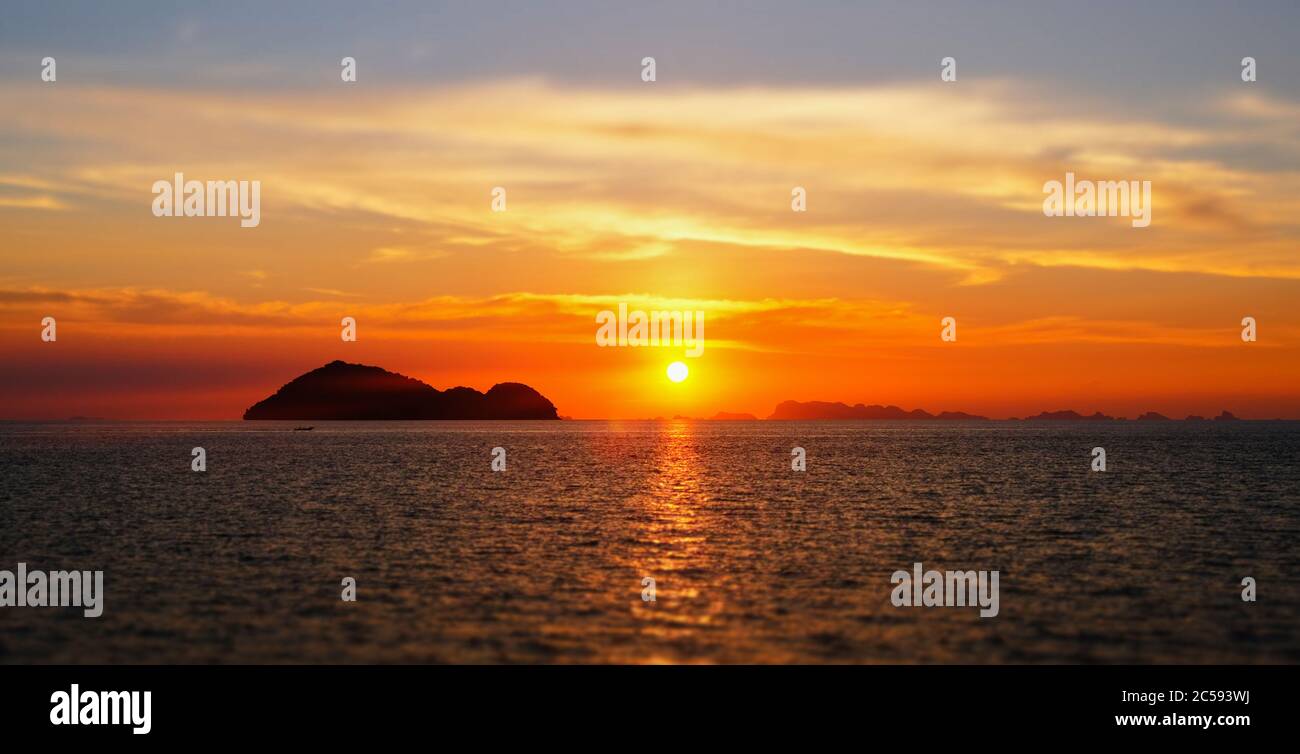 Bright sunset under the sea surface in Thailand Stock Photo