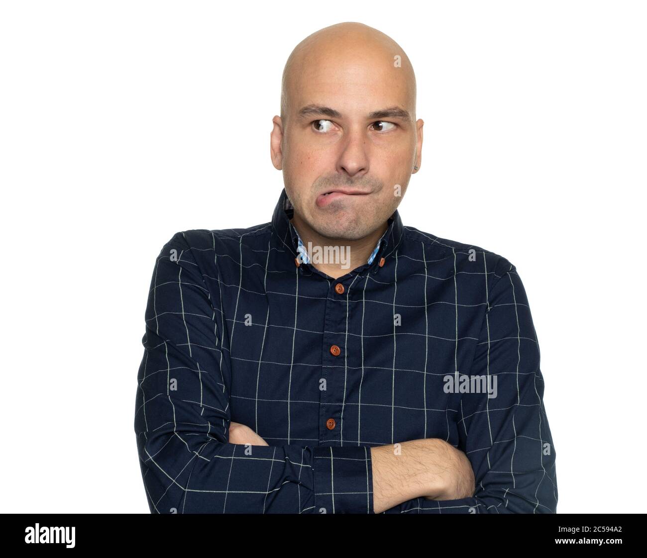 Nervous middle aged bald man looking away isolated on white Stock Photo