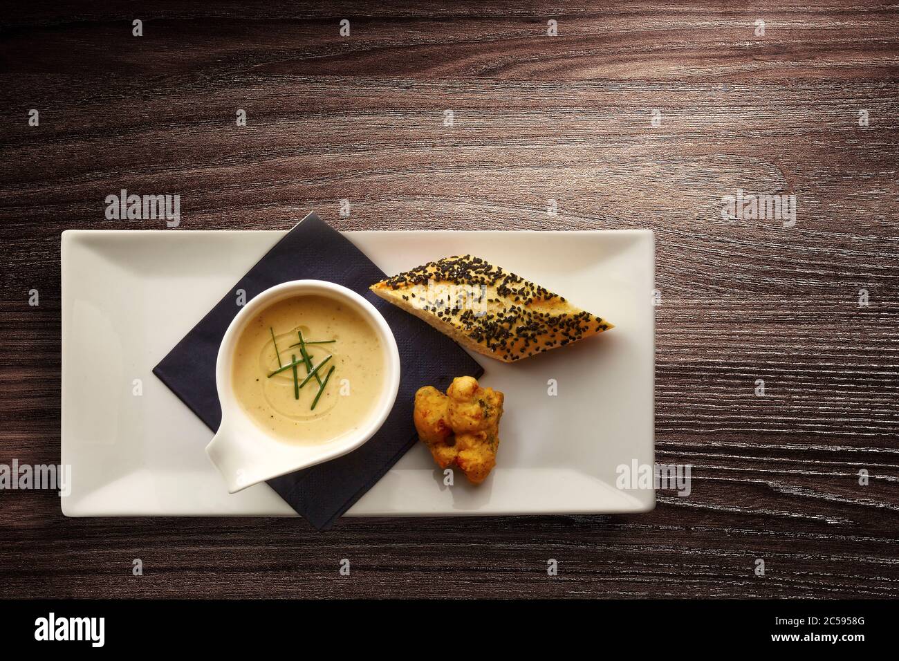Directly above photograph of a stylish Nouvelle Cuisine bowl of cream soup Stock Photo