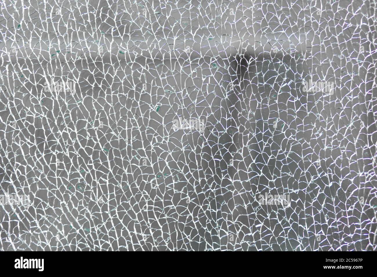 Broken tempered glass. Cracked glass web Stock Photo Alamy