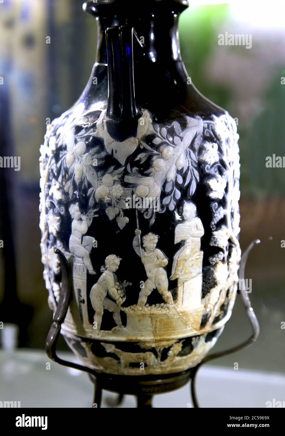 Amphoriskos know as the blue vase. Cameo glass vase with cupids. From Pompeii. 1st century AD. Naples Archaeological Museum, Italy. Stock Photo