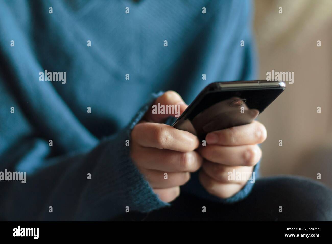 Woman using smartphone Stock Photo