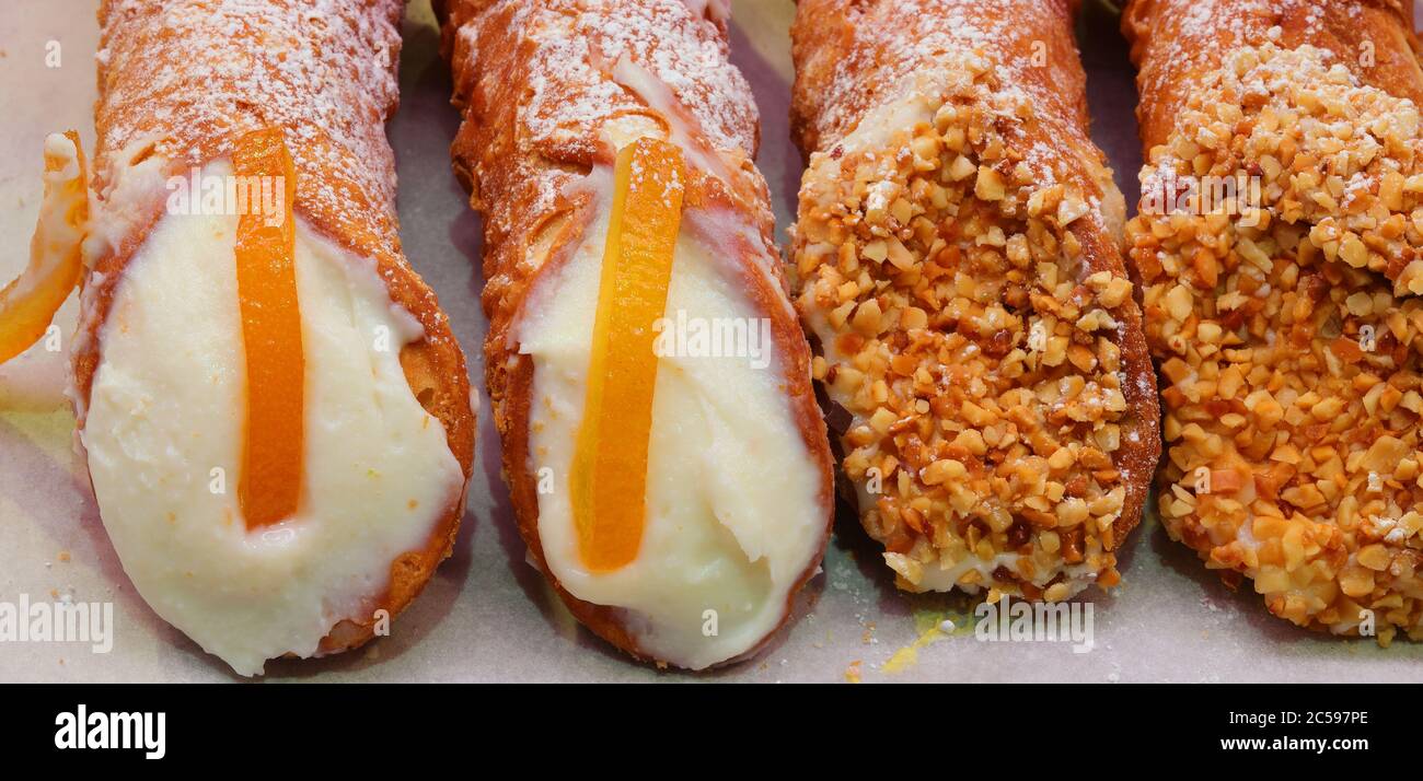 pastries with Orange and cheese called Cannolo Siciliano in Italian language Stock Photo