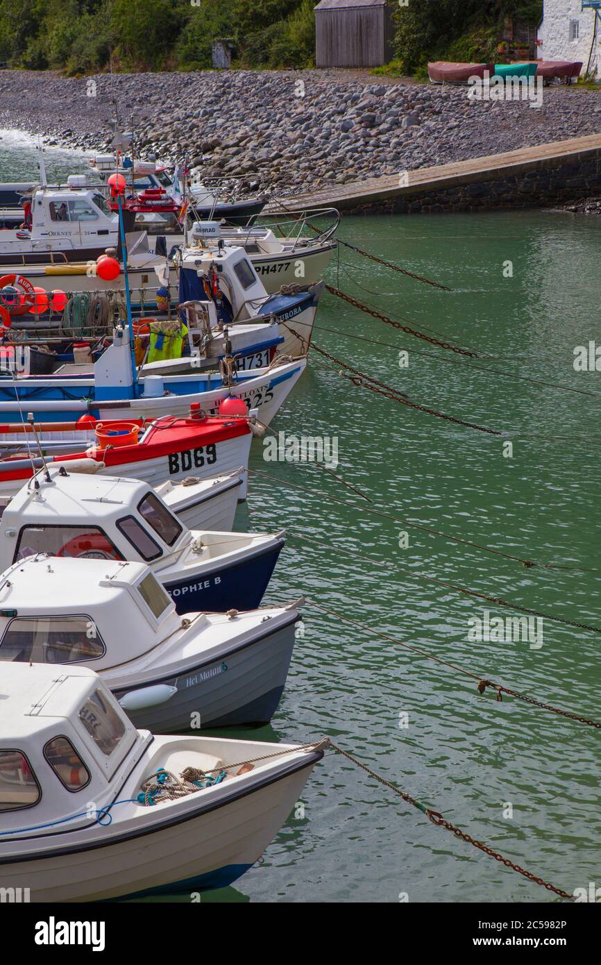 Boats moored in Clovelly harbour, North Devon, England Stock Photo