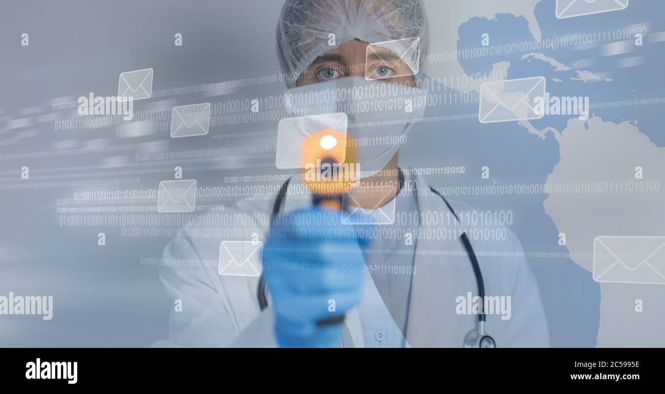 Email icons against doctor using electronic thermometer Stock Photo