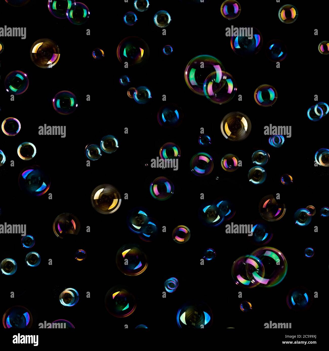 Soap bubbles over black background. Seamless texture Stock Photo Alamy