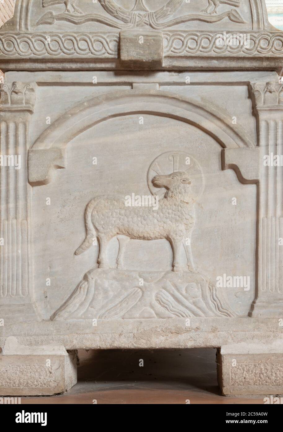 RAVENNA, ITALY - JANUARY 29, 2020: The detail of early christian tomb in the church Basilica of Sant Apolinare in Classe with Lamb of God symbolic. Stock Photo