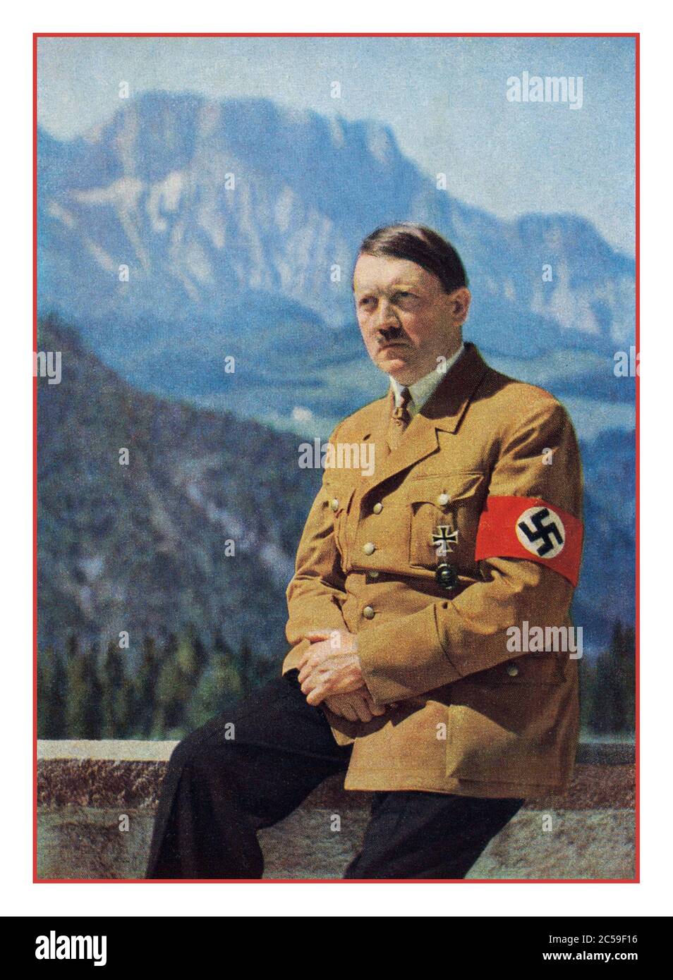 1940's Adolf Hitler informal portrait in uniform with swastika armband photographed outdoors with mountain backdrop, by his personal photographer Heinrich Hoffmann at his mountain retreat The Berghof near Berchtesgaden Obersalzberg Bavaria Germany Stock Photo