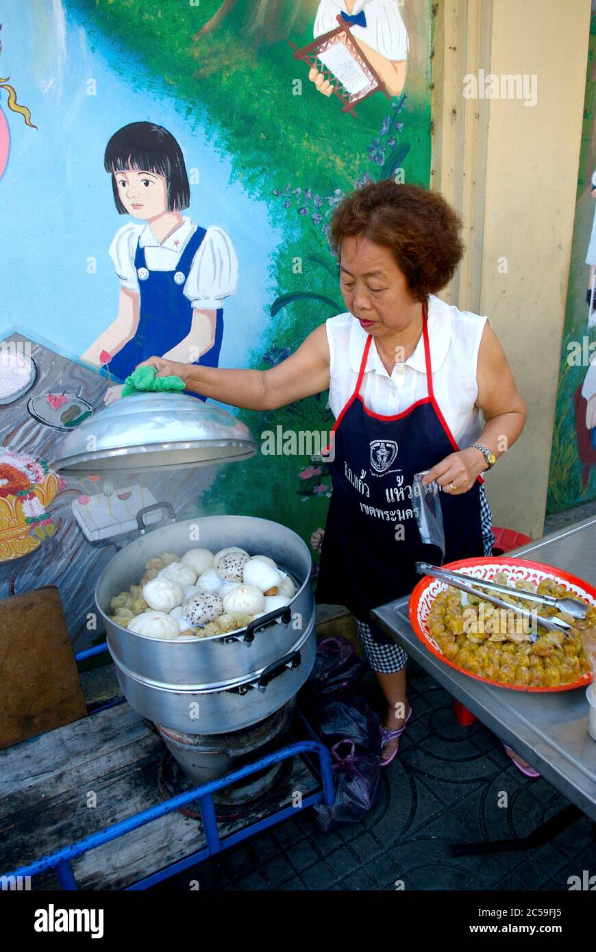Thailand, Bangkok, street food street cooking small brioche stuffed ...