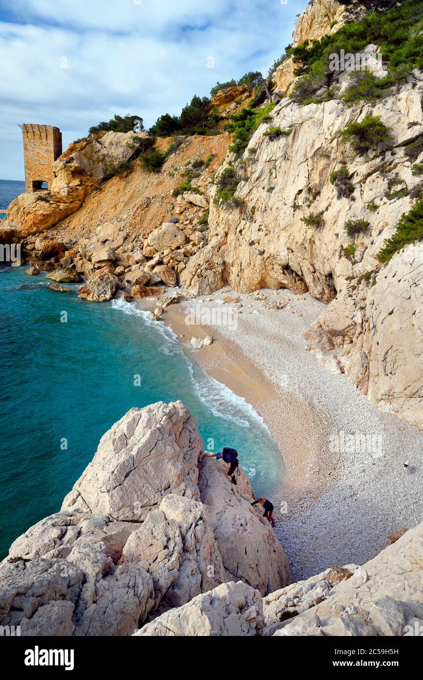 France, Bouches du Rhone, Ensues-la-Redonne towards Marseille, the Cote Bleue (Blue Coast), hike from Niolon to Cap Méjean along the Customs Trail, the small beach of the Erevine Calanque Stock Photo