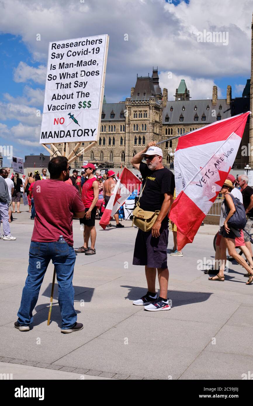 Ottawa, Canada. July 1st, 2020. Crowd of a few hundreds rallied in front of the Canadian Parliament on Canada day to show their displeasure with the Trudeau government. The complaints ranged from a variety of subjects but mainly focus on the current Covid 19 crisis. Credit: meanderingemu/Alamy Live News Stock Photo