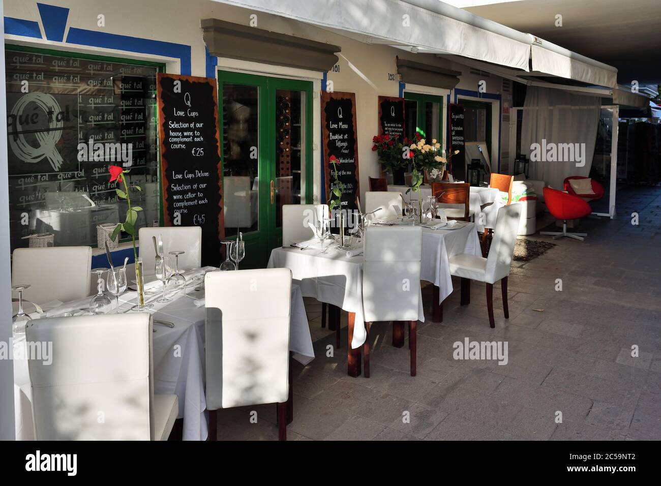 Puerto de Mogan, Gran Canaria - Feb 27, 2014: Empty street cafe shown in Puerto de Mogan, Spain. Favorite vacation place for tourists and locals on is Stock Photo