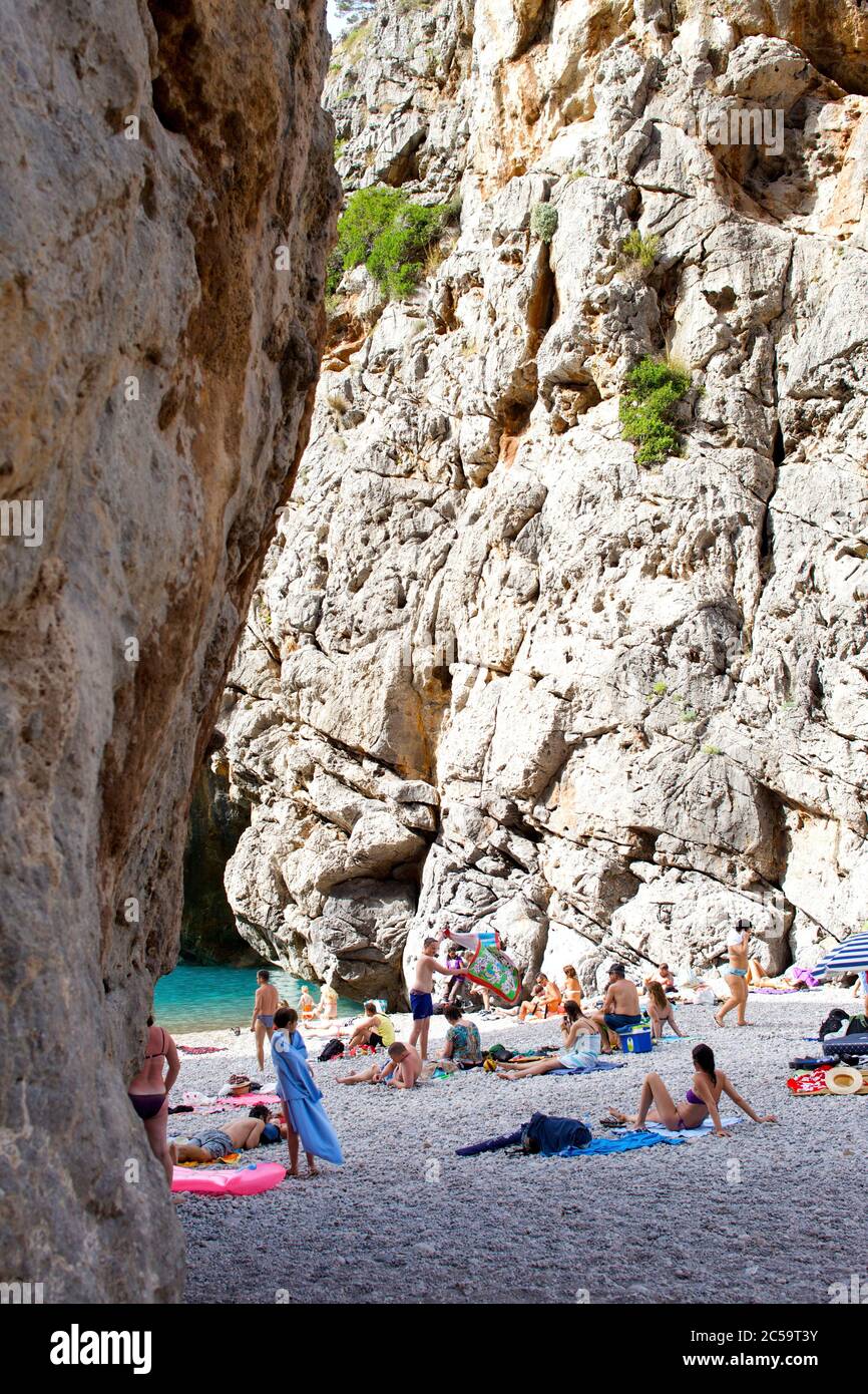Spain, Balearic Islands, island of Majorca, beach and swimming towards el torrent de pareis Stock Photo