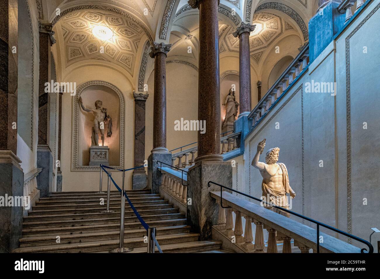 Italy Lazio - Palazzo Braschi in Rome: the elegant monumental staircase probably by Valadier, adorned with ancient statues and stuccos Stock Photo