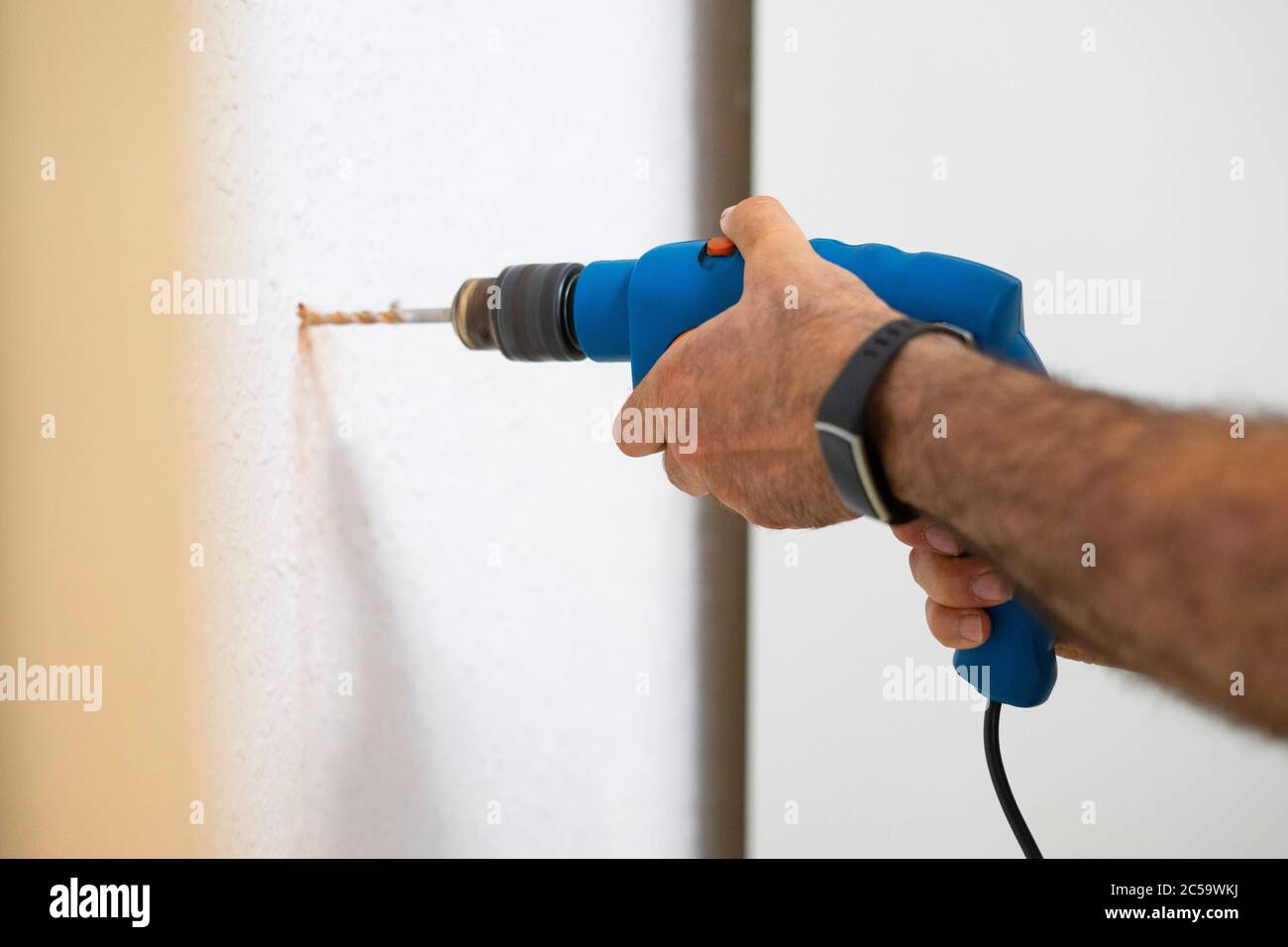 Drilling A Hole In The Wall With A Drill Stock Photo - Download Image Now -  Color Image, Craft, Drill - iStock