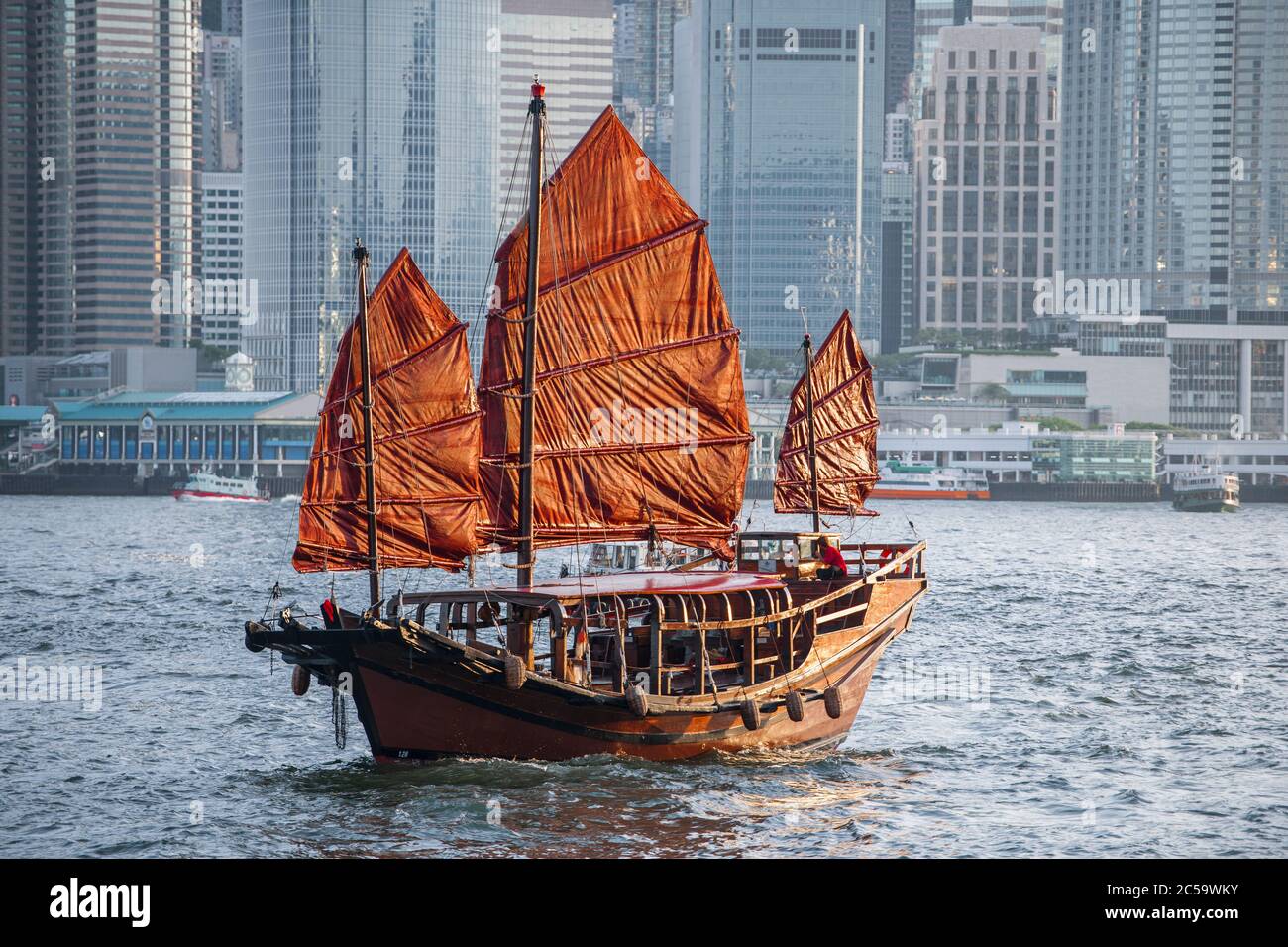 traditional junk boat at Victoria Harbour in Hong Kong Stock Photo Alamy