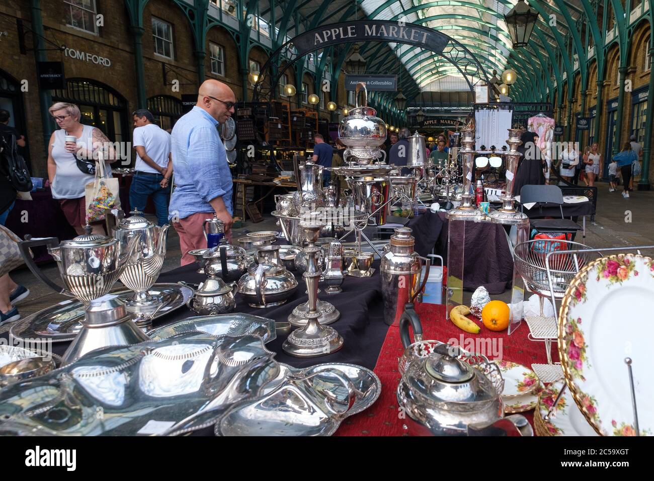 Stall selling antique silverware at the Apple Market at Covent Garden