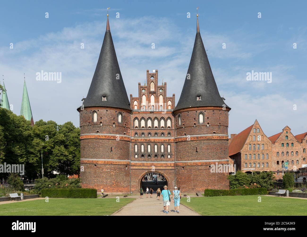 The Holstentor ('Holstein Gate') is a city gate that borders the old town of the Hanseatic city of Luebeck to the west. It is the symbol of the city. Stock Photo