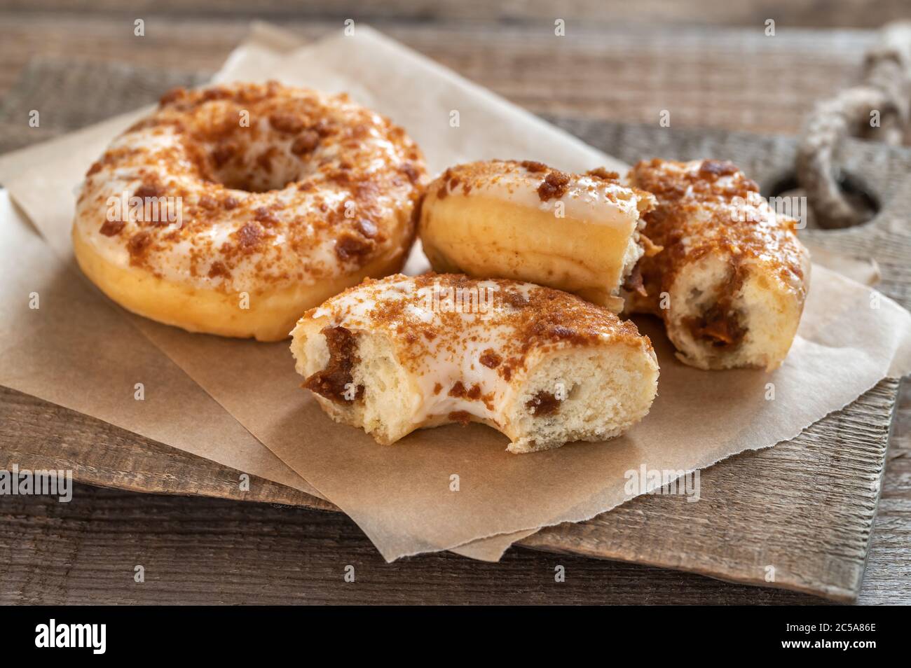 Two donuts on the wooden board Stock Photo