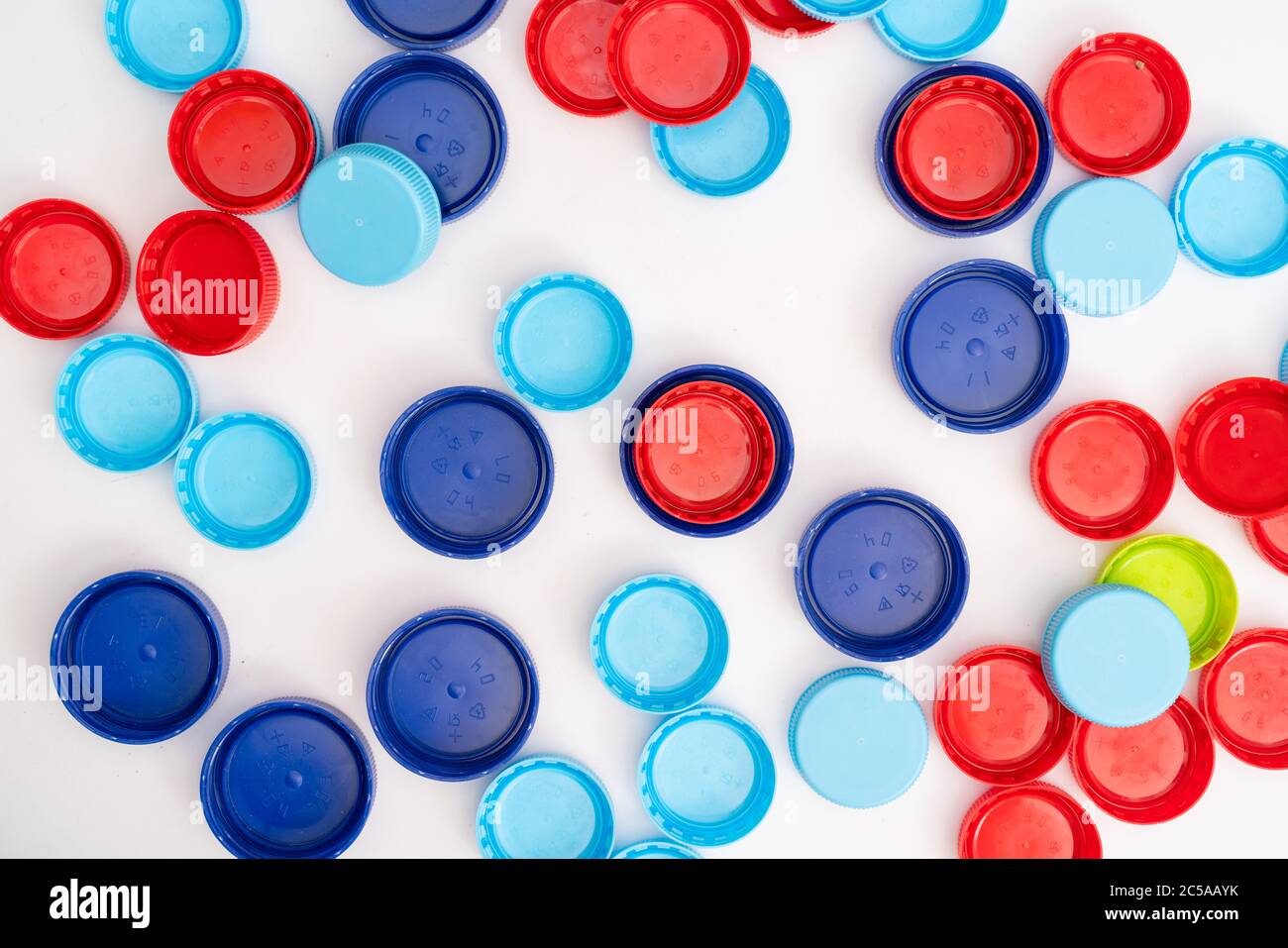 Plastic bottle caps. Separate garbage collection. Waste disposal Stock Photo Alamy