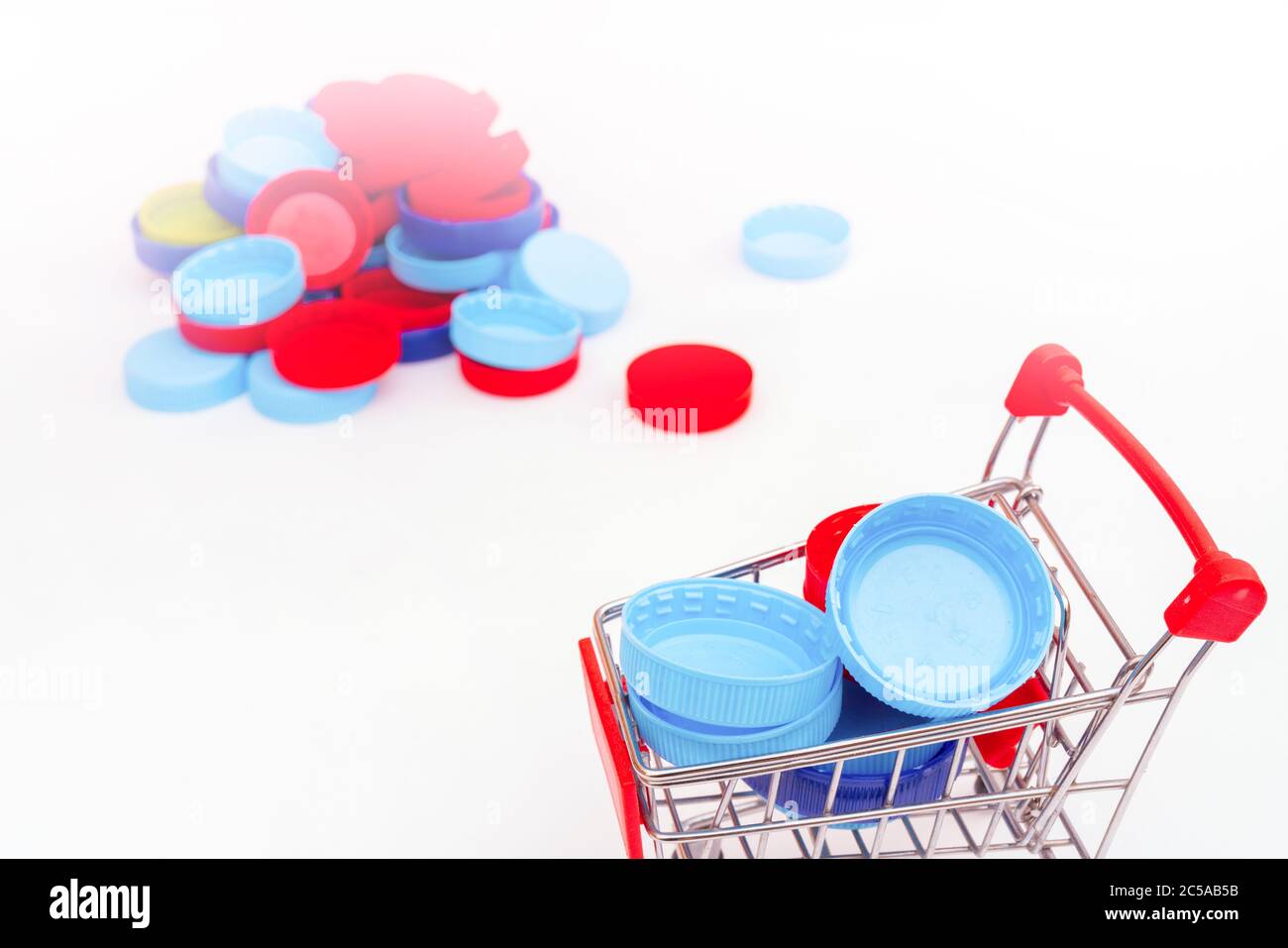Plastic bottle caps. Separate garbage collection. Waste disposal Stock
