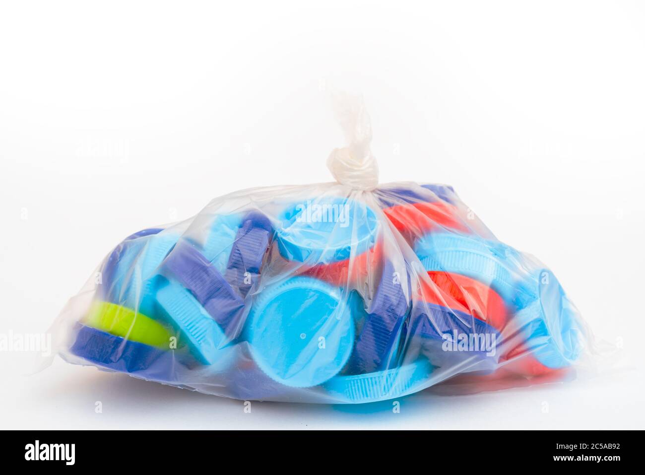 Plastic bottle caps. Separate garbage collection. Waste disposal Stock