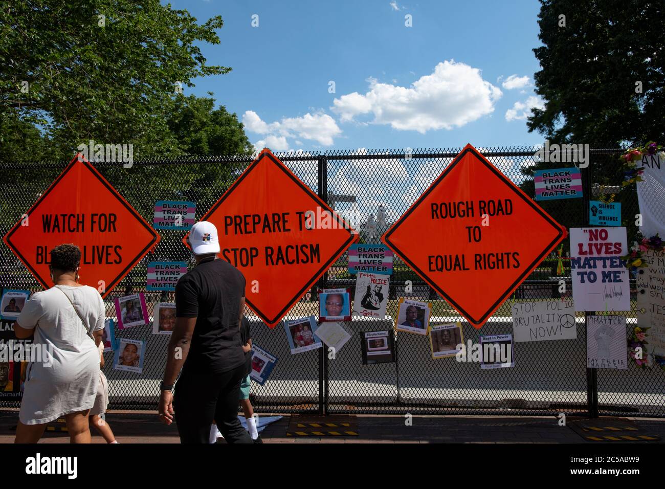 USA Washington DC protest signs against racism attached to a temporary fence around Lafayette Square Stock Photo