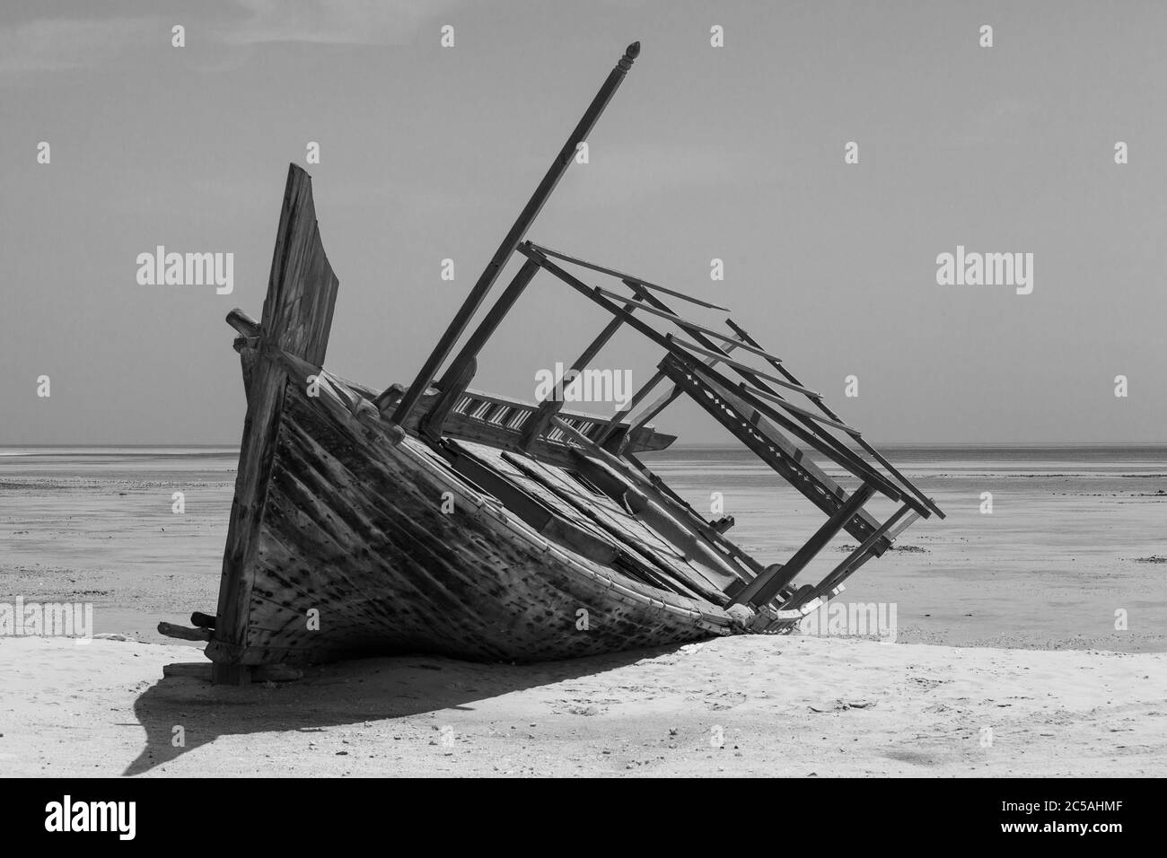 Traditional Dhow boats on display on the beach at Al Wakra Stock Photo