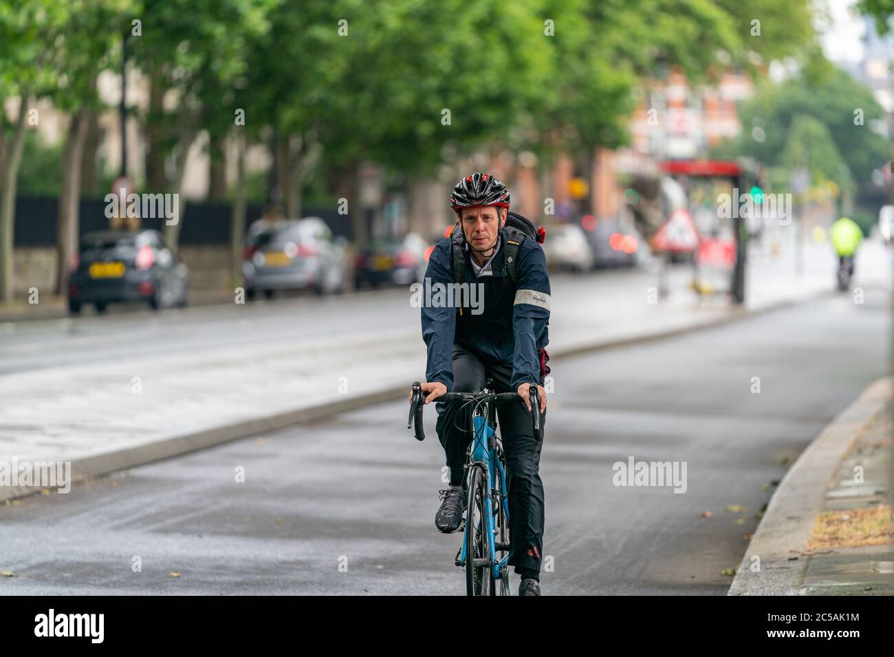 Man wearing crash helmet hi-res stock photography and images - Alamy