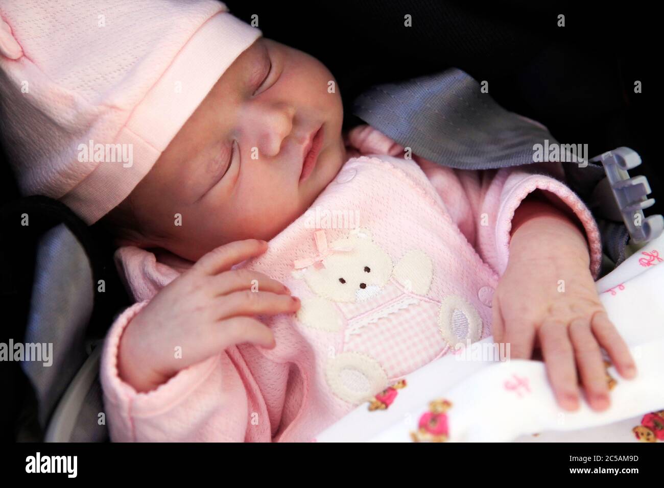Sleeping newborn baby. The first days of life of the newborn girl Stock Photo