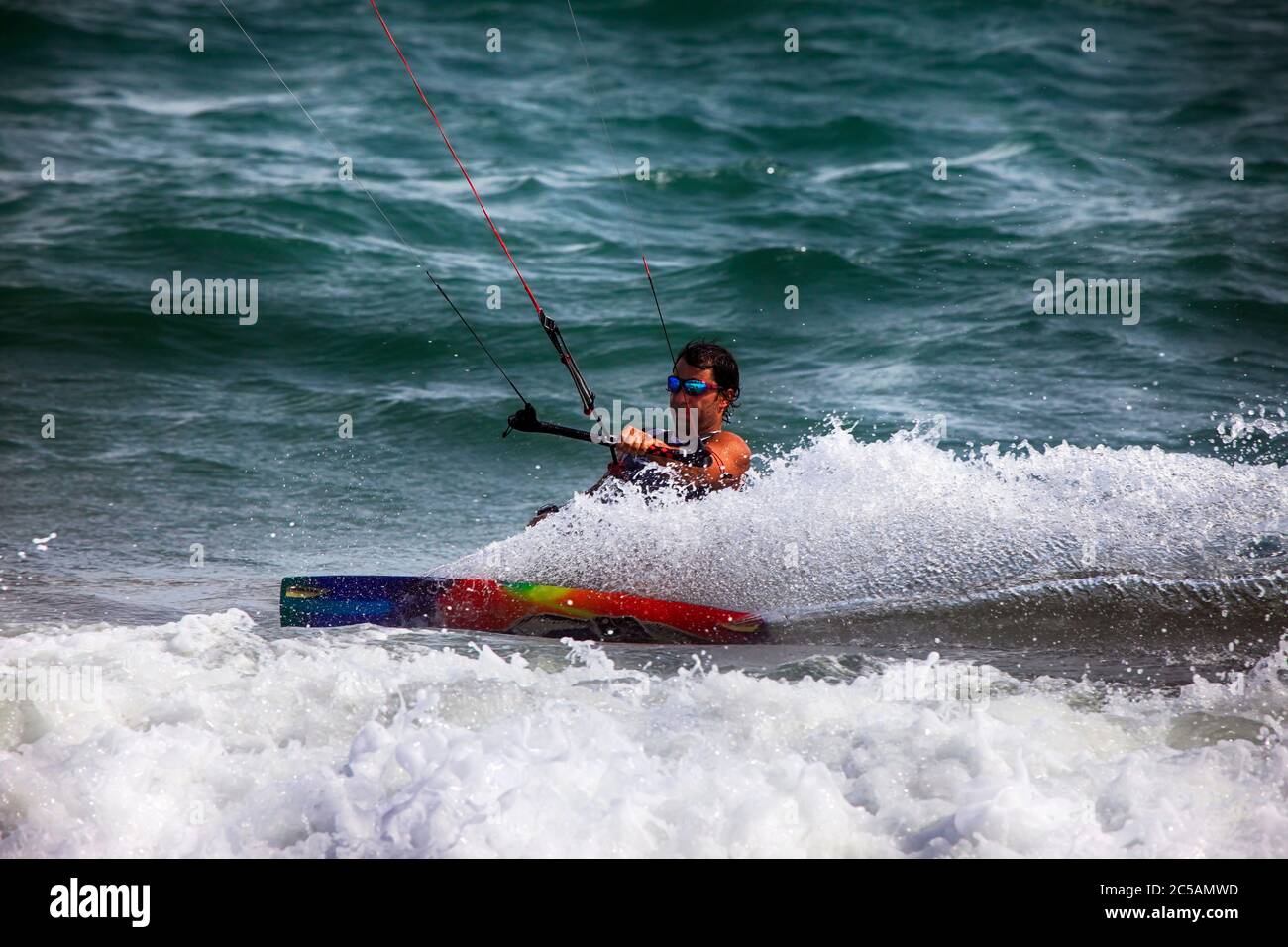 Kiteboarder enjoy surfing in ocean. Vietnam Stock Photo