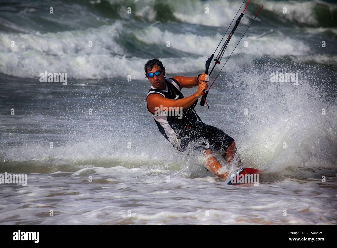 Kiteboarder enjoy surfing in ocean. Vietnam Stock Photo