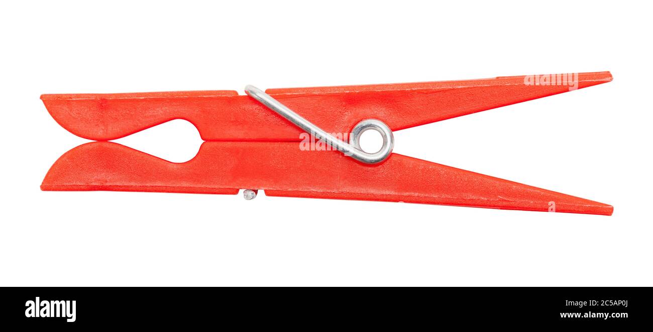 Red Plastic Clothespin Cut Out on White. Stock Photo