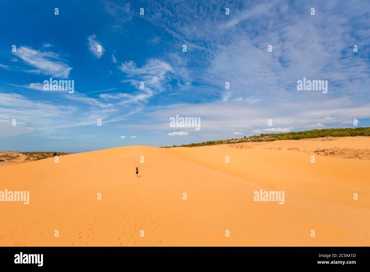 Beautiful caucasian girl having fun on Red sand dunes in Mui Ne, Phan ...