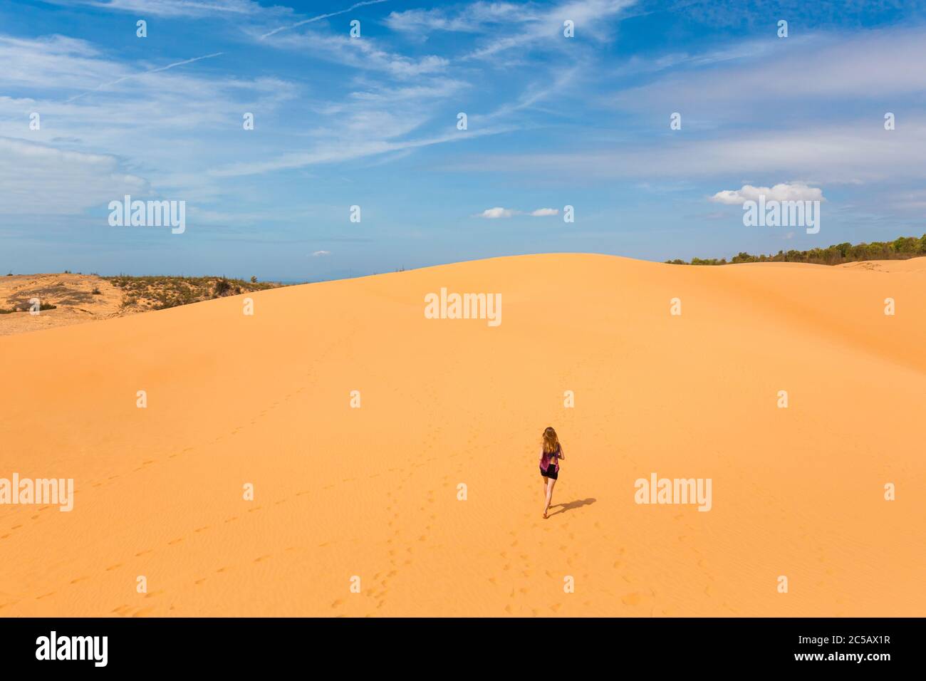 Beautiful caucasian girl having fun on Red sand dunes in Mui Ne, Phan ...