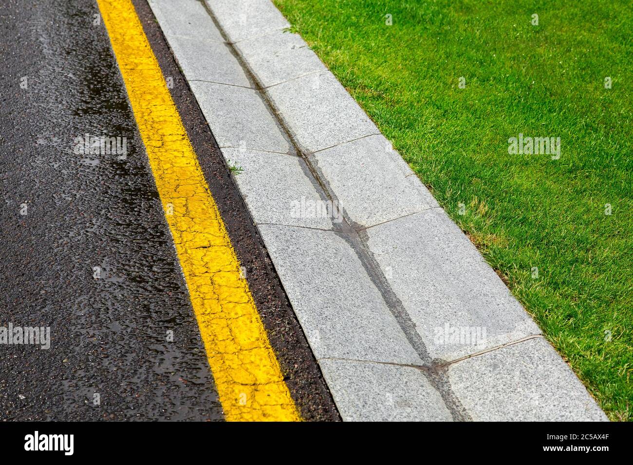 rainwater in the canal is a cement ditch of a drainage system on the