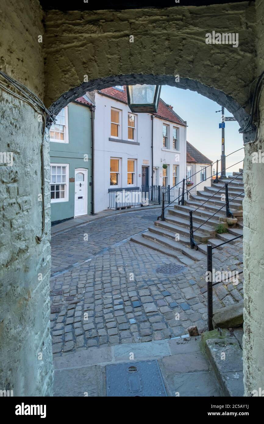 View from Kiln Alley alleyway at the base of 199 steps, Whitby, North Yorkshire Stock Photo