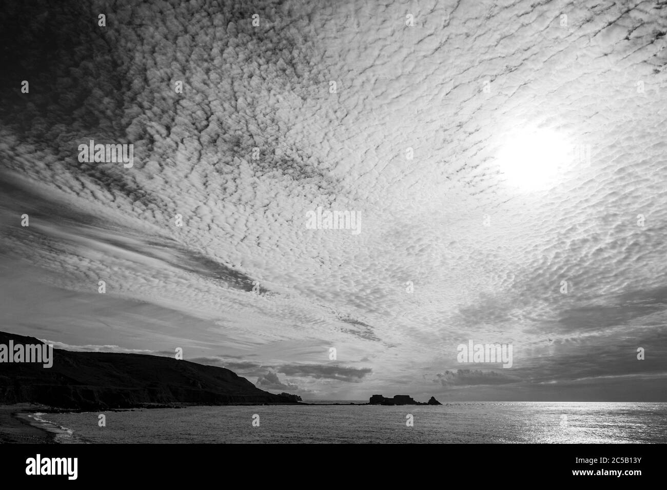 Dramatic sky over Fort Clonque, Alderney, Channel Islands (monochrome image) Stock Photo