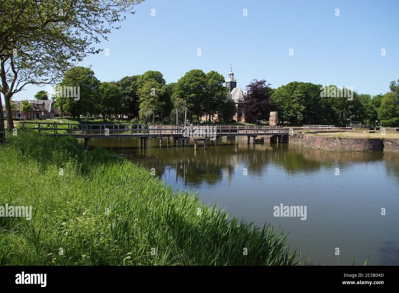 Bridge over castle moat to ruins of Egmond Castle or Slot op den Hoef