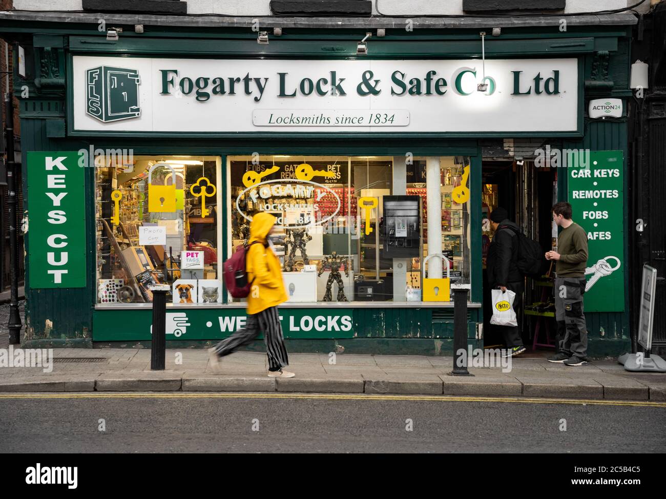 People and a typical locksmith store. Dublin, Ireland. Stock Photo