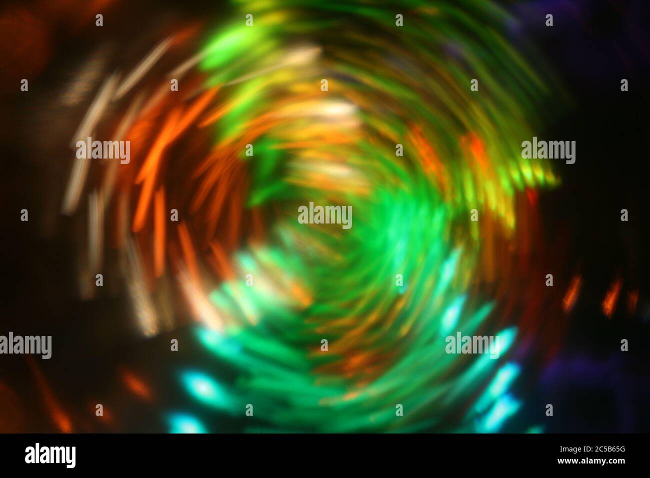 Horizontal shot of staggered and refracted light layersvortex light