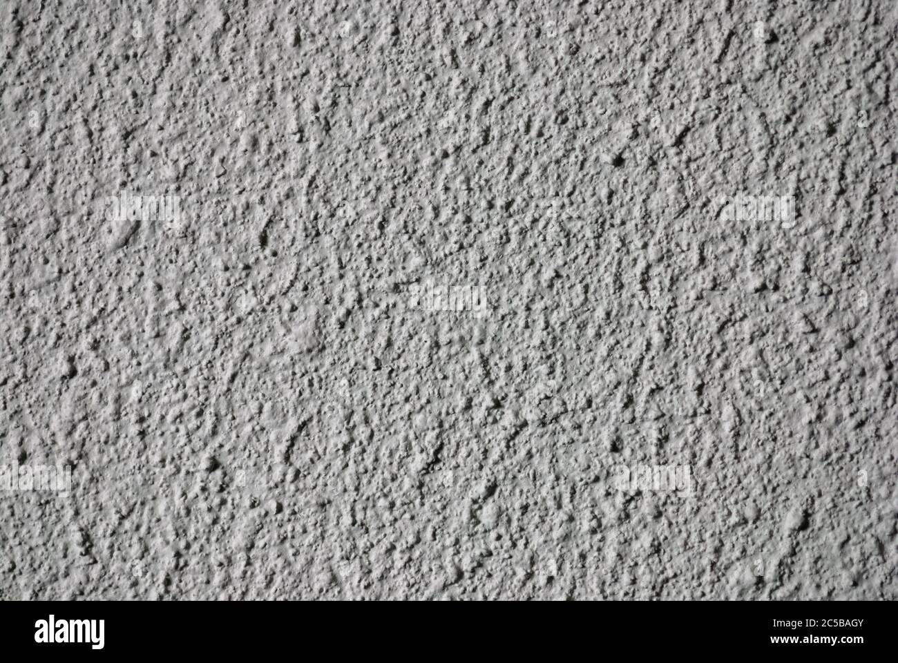 rough unsmooth gray cement wall texture Stock Photo