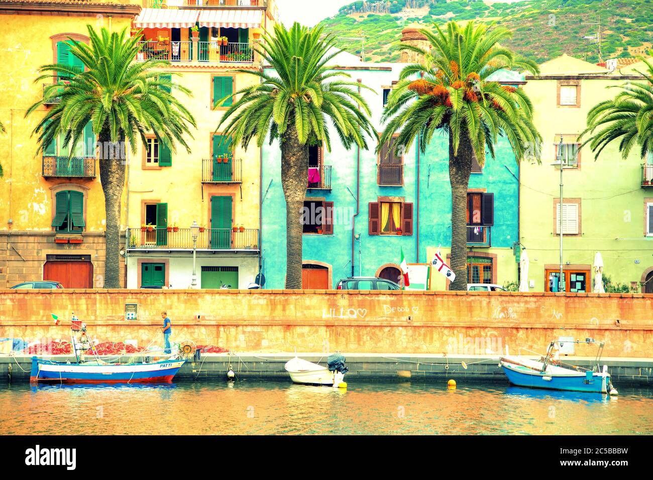 View of the river, the town of Bosa and the old fort on the island of ...
