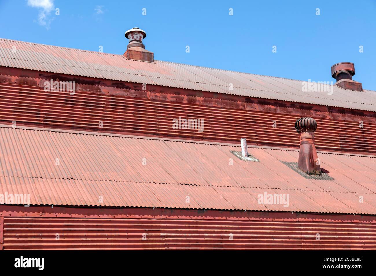 Old Commercial building, metal roof and siding, rusted, by James D ...