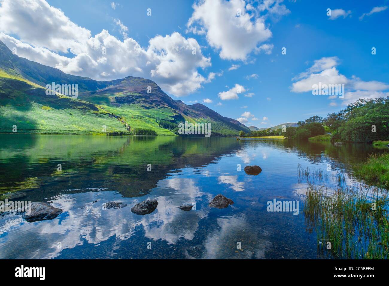 Mountains reflected on a lake at the Lake District in England Stock Photo
