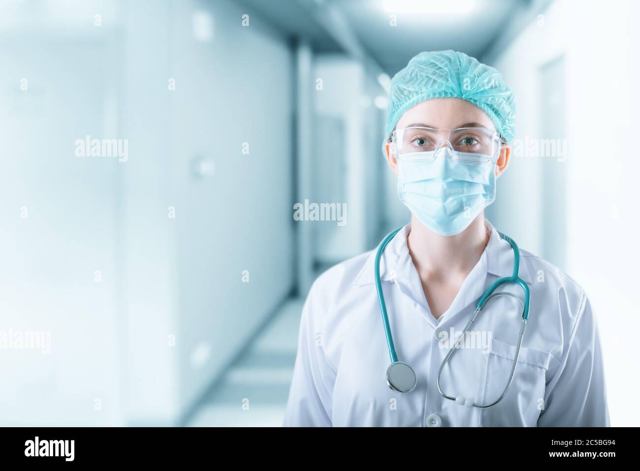Medical Surgical Doctor and Health Care, Portrait of Surgeon Doctor in PPE Equipment on Isolated Background. Medicine Female Doctors Wearing Face Mask Stock Photo
