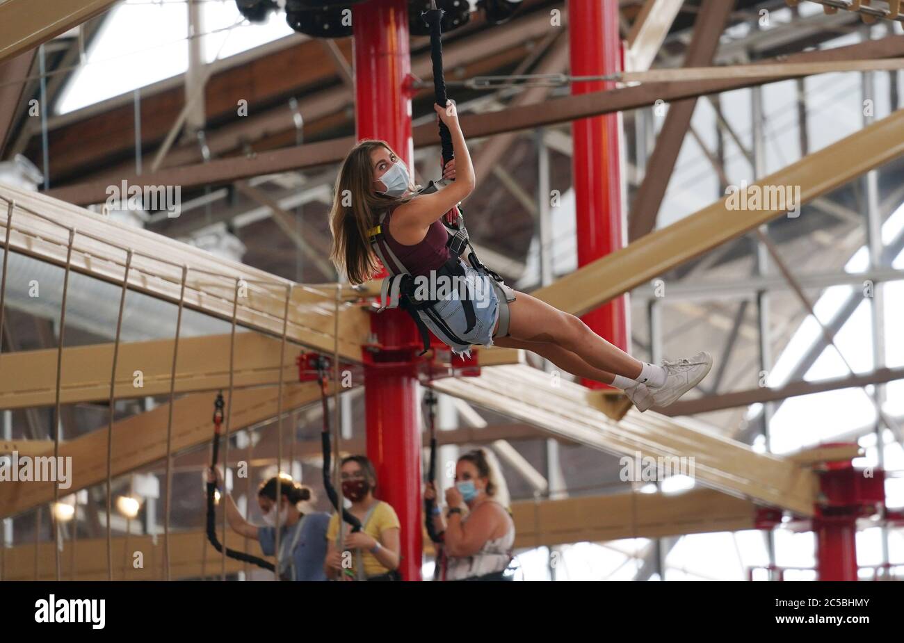 St. Louis, United States. 01st July, 2020. A woman rides down the Ropes Course atop St. Louis Union Station in St. Louis on Wednesday, July 1, 2020. More than 90,000-cubic feet of climbing space and 30 obstacles take participants almost to the top of the former trainshed. Photo by .Bill Greenblatt//UPI Credit: UPI/Alamy Live News Stock Photo