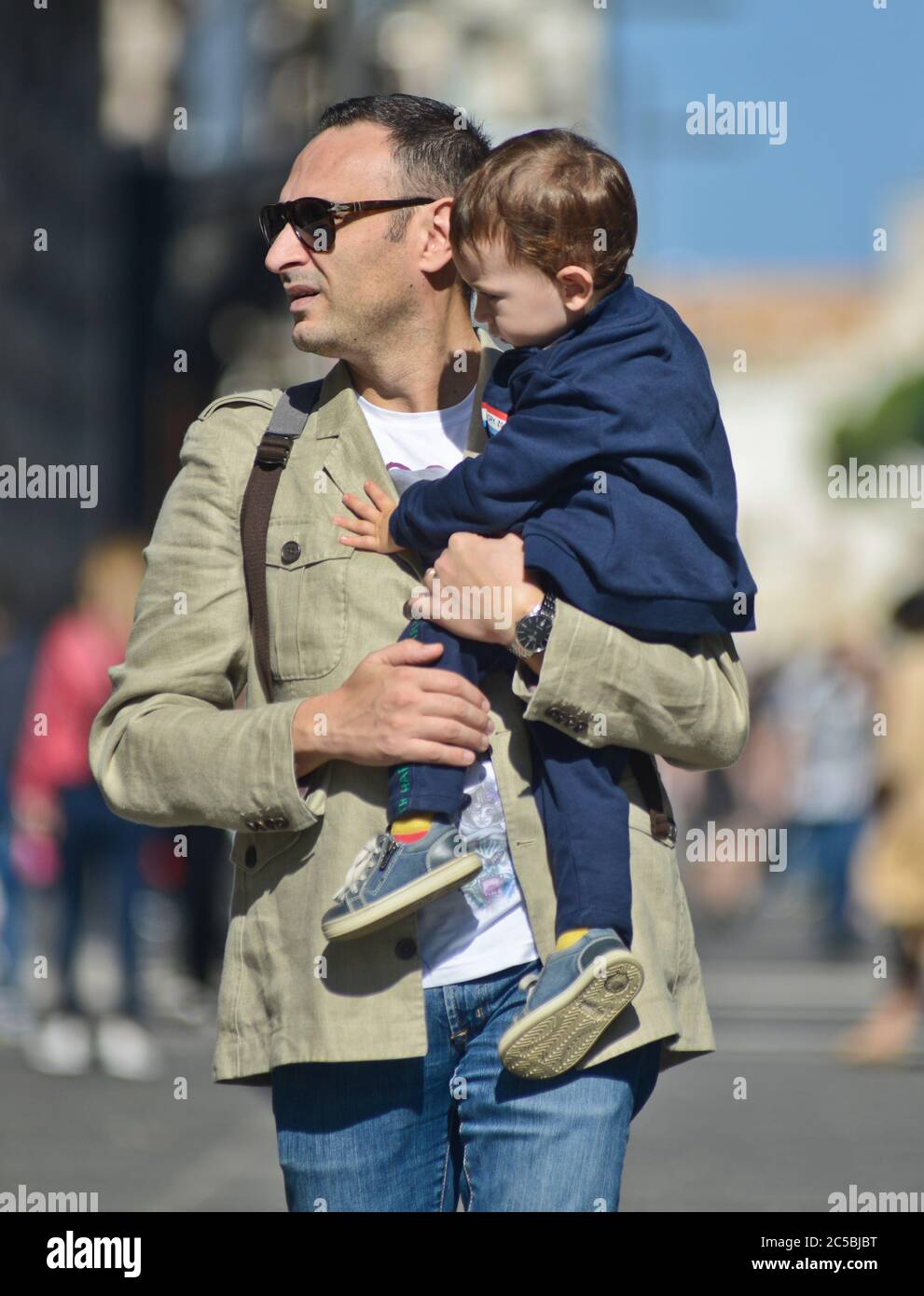 Italian father with his son walking in Via Sparano da Bari. Bari, Italy Stock Photo