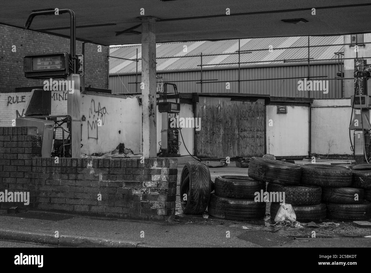 Industrial areas, abandoned, run down, ugly pretty, neglected petrol station, old buildings, neglected roads, industry, gas station, petrol, ruined Stock Photo