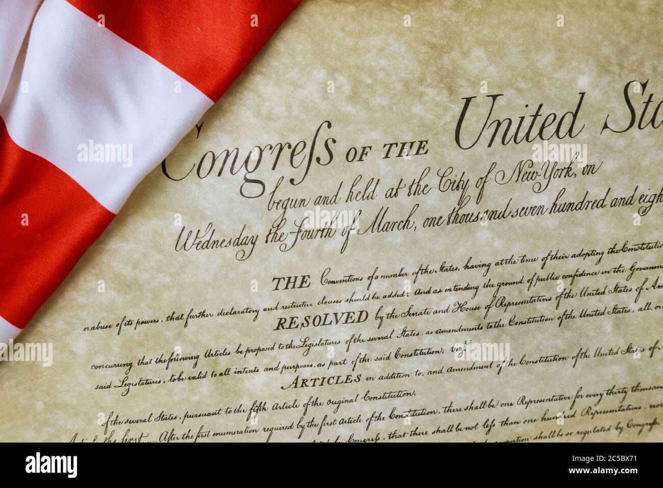 Preamble to the Constitution of the United States of America of closeup of ruffled American flag Stock Photo
